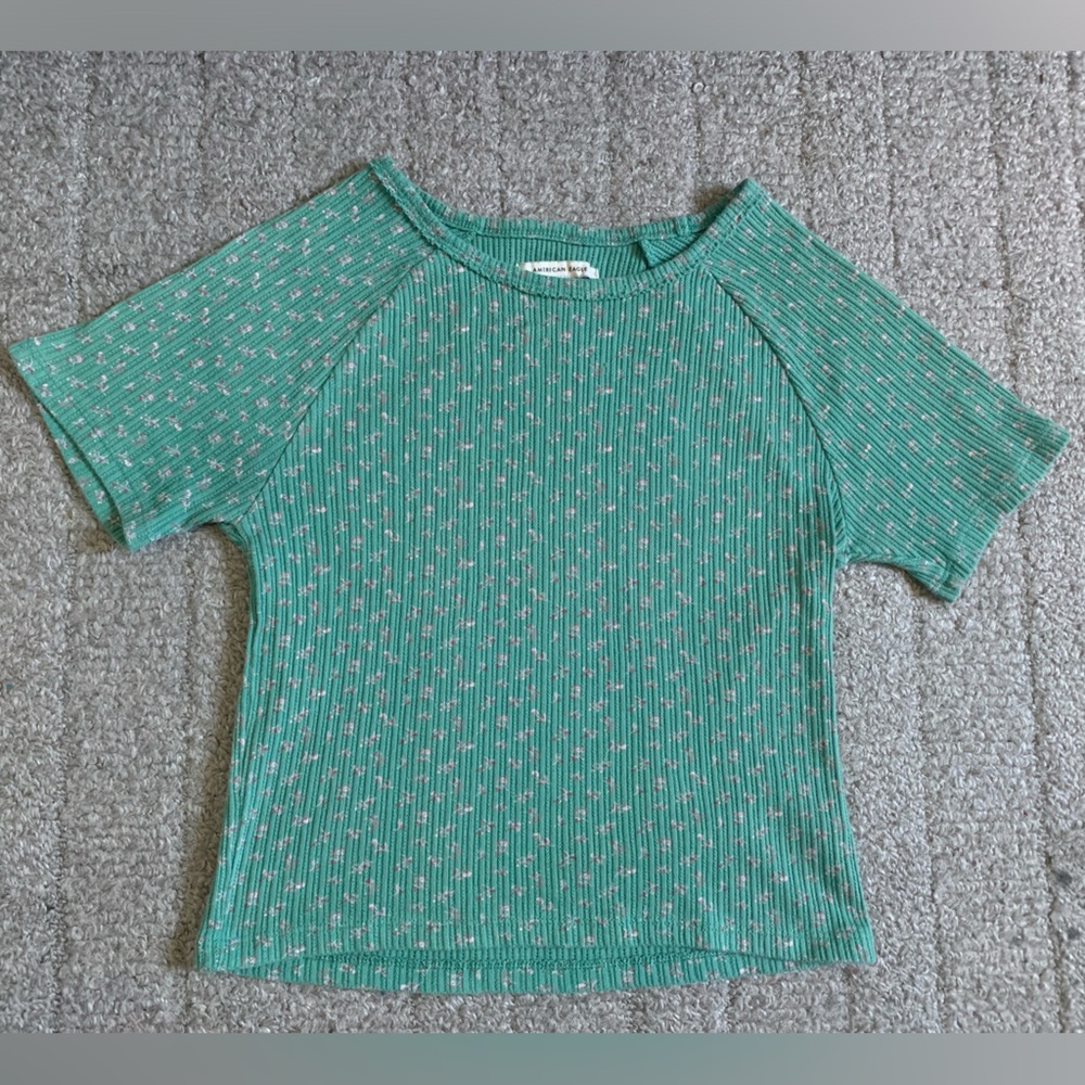 Green floral American Eagle baby tee.